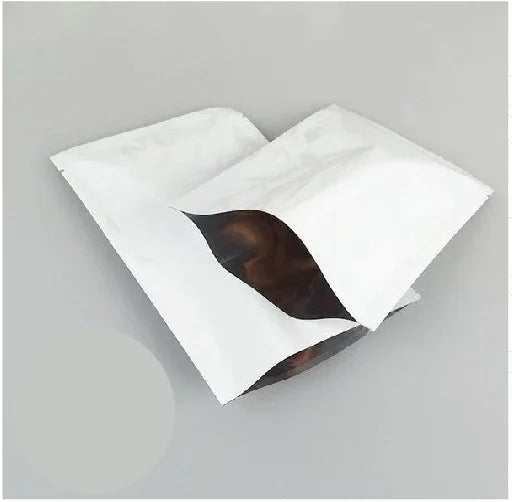 White stand-up zipper pouch with foil lining, ideal for premium food packaging and custom branding