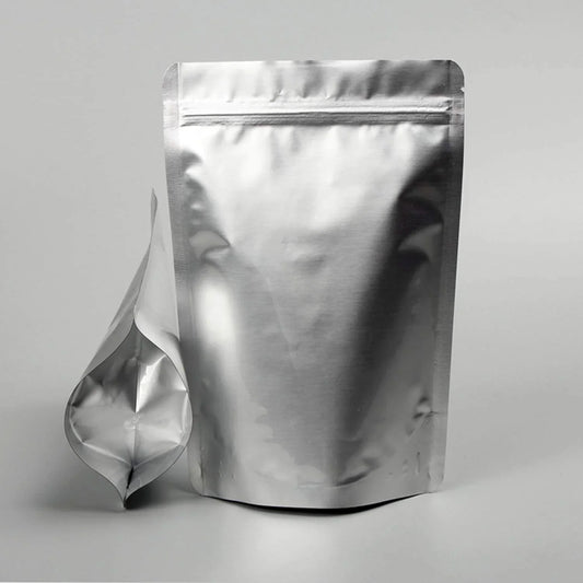 Shiny silver stand-up zipper pouch with resealable top, ideal for premium product packaging