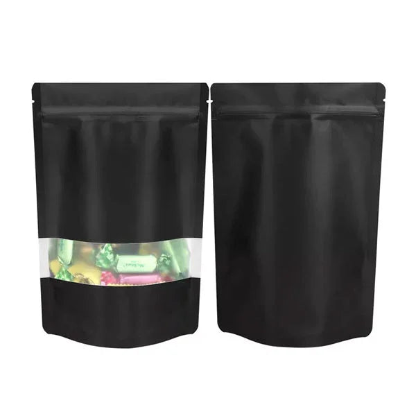 Black stand-up zipper pouch with clear window, ideal for candy or snack packaging