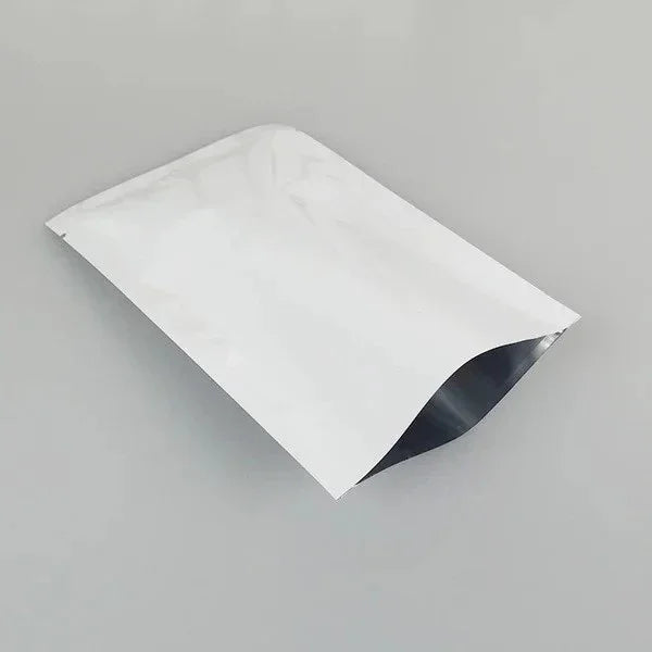 Shiny aluminum foil stand-up pouch with zipper, ideal for premium food packaging and wholesale branding.