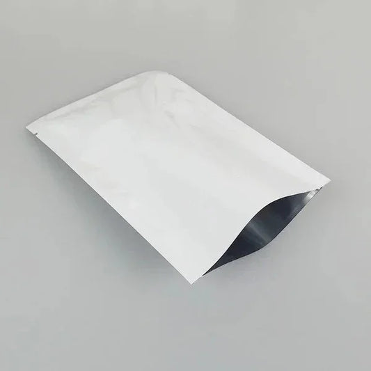 Shiny aluminum foil stand-up pouch with zipper, ideal for premium food packaging and wholesale branding.