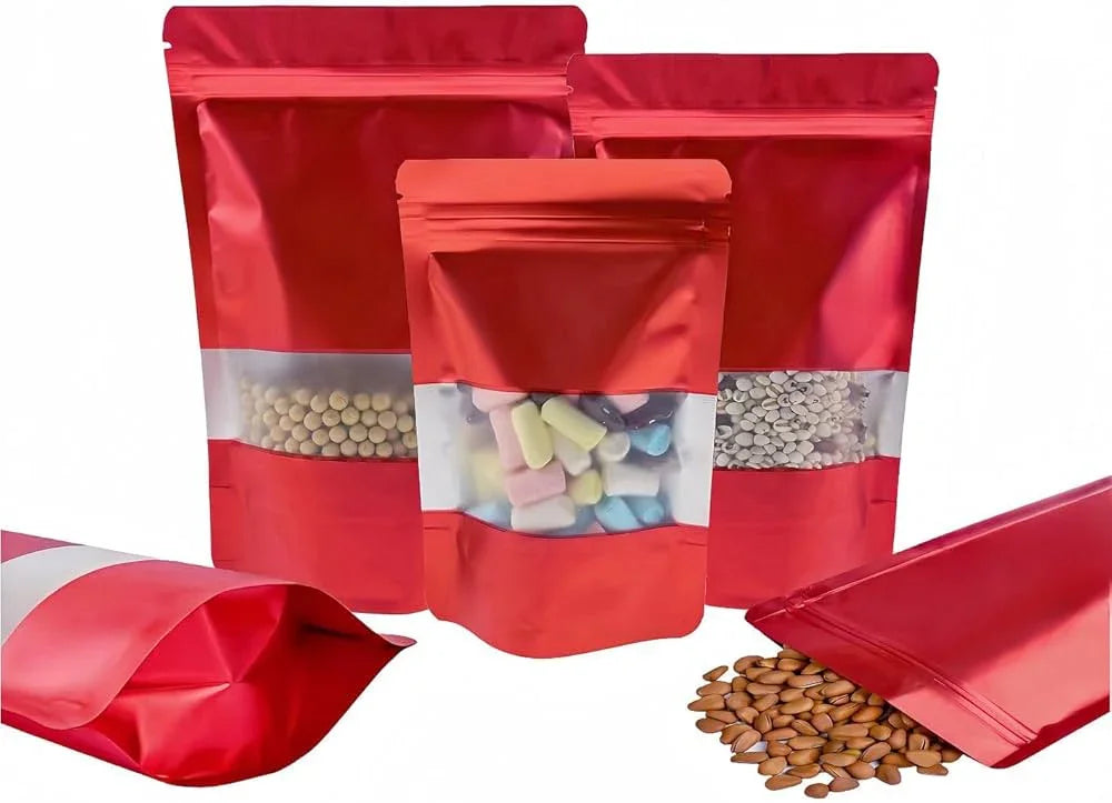 Red stand-up zipper pouches with clear window, holding snacks and nuts, ideal for custom packaging