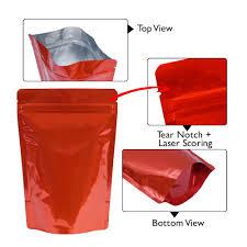 Red stand-up zipper pouch with tear notch, laser scoring, top & bottom views for flexible packaging